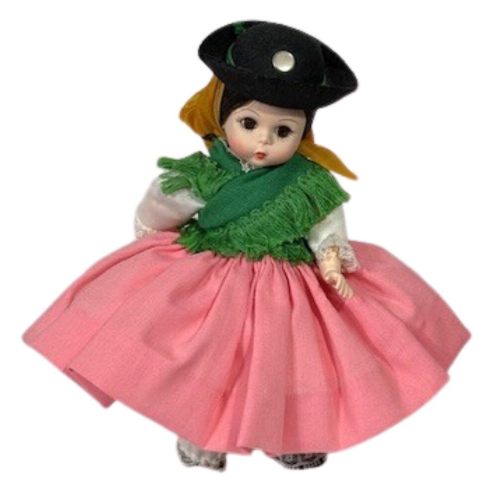 Madame Alexander restrung 8" Portugal doll with stand.